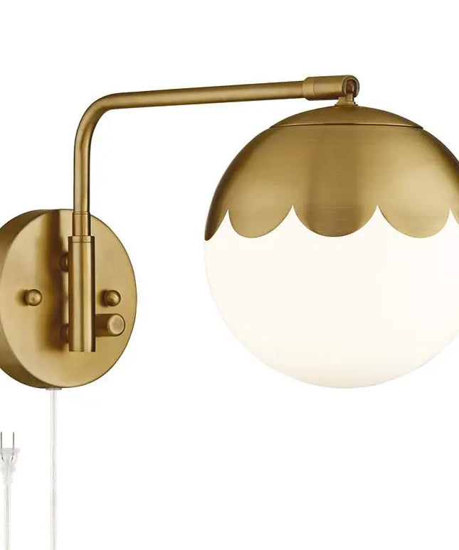 Camila 8 1/4" Brass and Glass Globe Plug-In Wall Lamp 360 Lightning