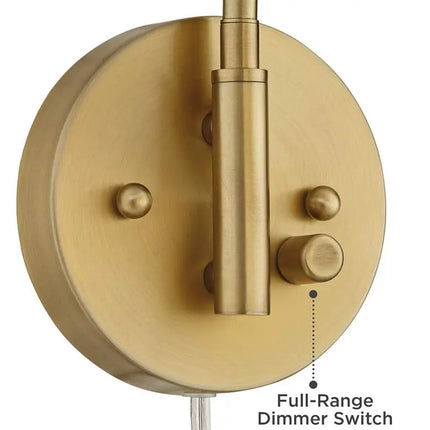 Camila 8 1/4" Brass and Glass Globe Plug-In Wall Lamp 360 Lightning