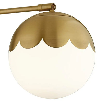 Camila 8 1/4" Brass and Glass Globe Plug-In Wall Lamp 360 Lightning